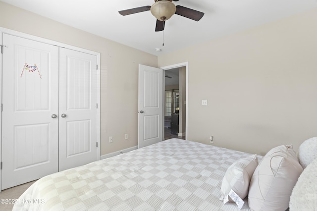 bedroom with a closet and ceiling fan