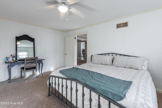 carpeted bedroom featuring crown molding and ceiling fan