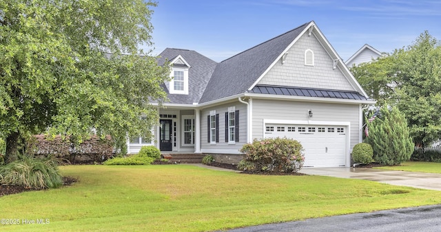 view of front facade with a garage and a front yard