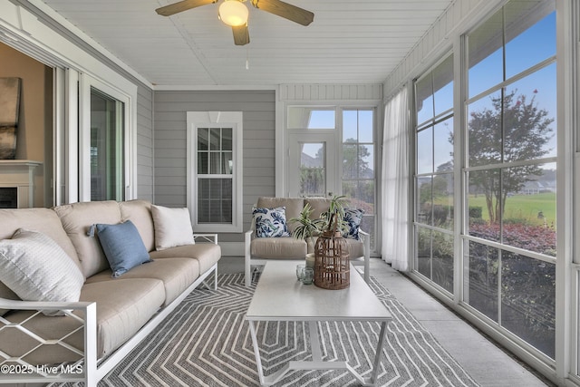 sunroom / solarium with ceiling fan