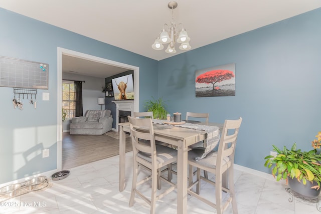 dining room featuring an inviting chandelier