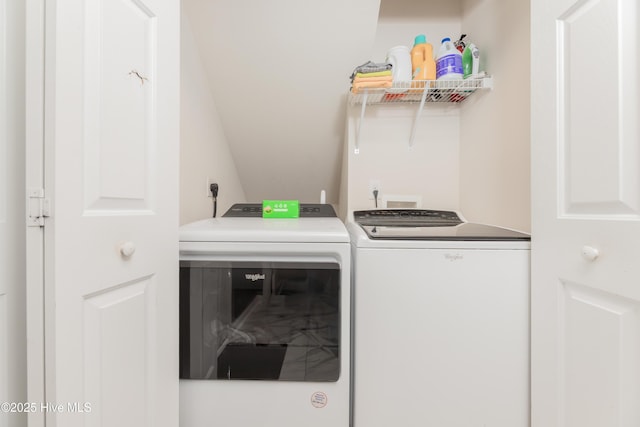 laundry room featuring washing machine and dryer