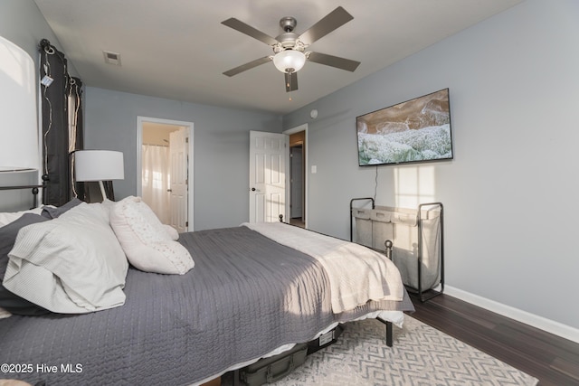 bedroom featuring ceiling fan and dark hardwood / wood-style flooring