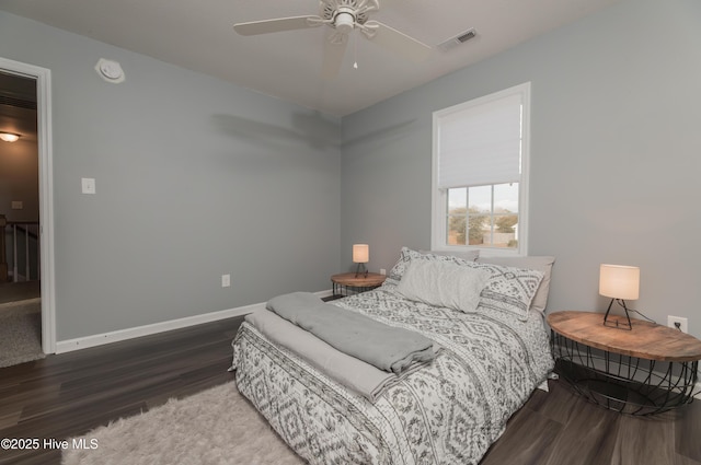 bedroom featuring dark wood-type flooring and ceiling fan