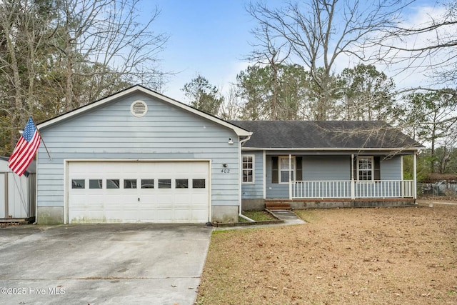 ranch-style home featuring a garage and a porch