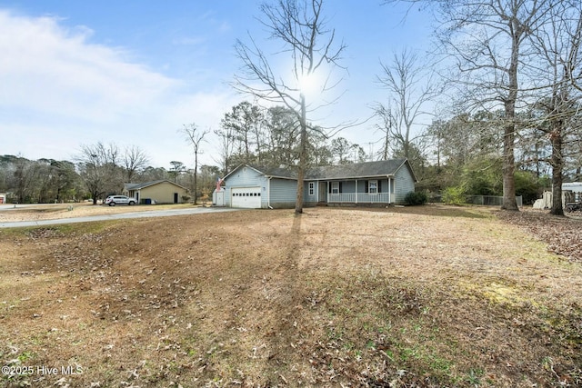 ranch-style house featuring a garage