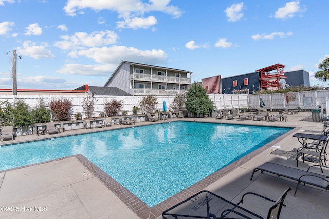 view of pool featuring a patio