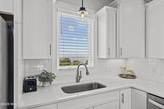 kitchen with sink and white cabinets