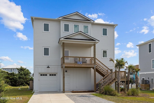 view of front facade with a garage and covered porch