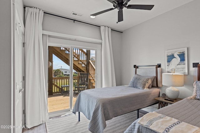 bedroom featuring ceiling fan, access to outside, and light wood-type flooring