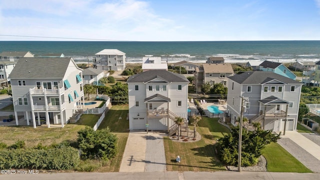 1903 Emerald Dr, Emerald Isle, NC 28594 - aerial perspective of suburban area featuring a nearby body of water and a pool area