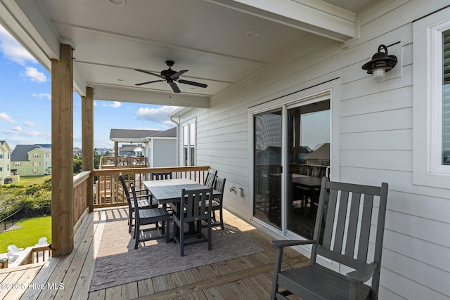 1903 Emerald Dr, Emerald Isle, NC 28594 - deck featuring outdoor dining space and ceiling fan