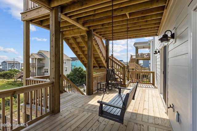 1903 Emerald Dr, Emerald Isle, NC 28594 - wooden terrace with stairs and a residential view