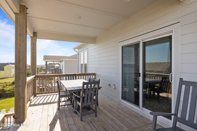 1903 Emerald Dr, Emerald Isle, NC 28594 - deck featuring outdoor dining space
