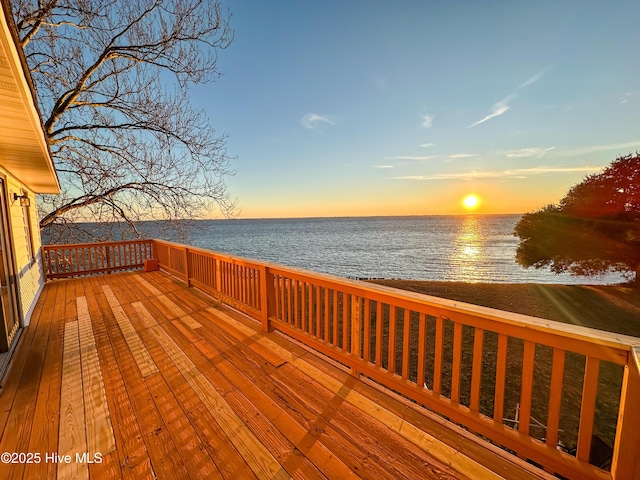 deck at dusk with a water view