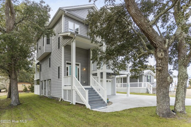 exterior space featuring a balcony and a garage