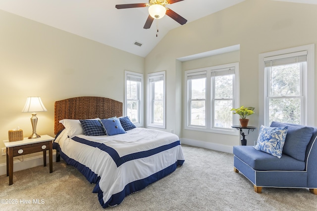 carpeted bedroom featuring ceiling fan and vaulted ceiling