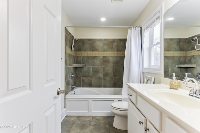 full bathroom featuring tile patterned flooring, vanity, shower / bathtub combination with curtain, and toilet