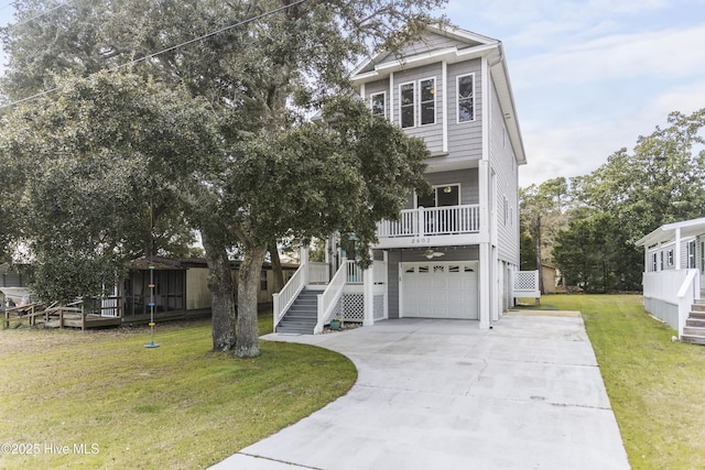 view of front facade featuring a garage and a front yard