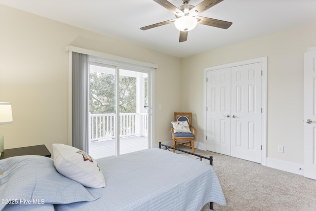 carpeted bedroom featuring ceiling fan, access to exterior, and a closet