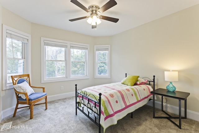 bedroom with ceiling fan and carpet flooring