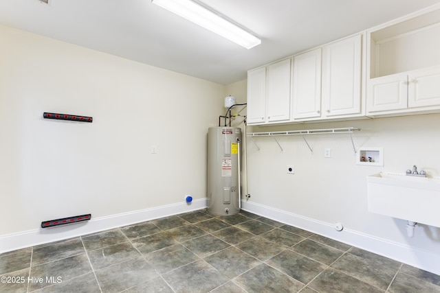 laundry area featuring sink, hookup for a washing machine, cabinets, electric water heater, and hookup for an electric dryer