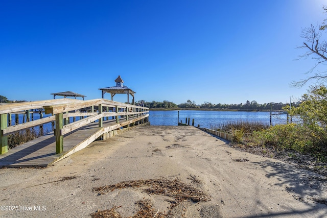 dock area with a water view