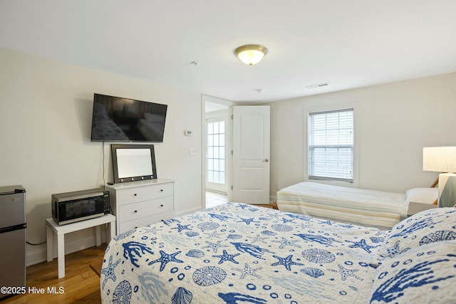 bedroom featuring hardwood / wood-style floors