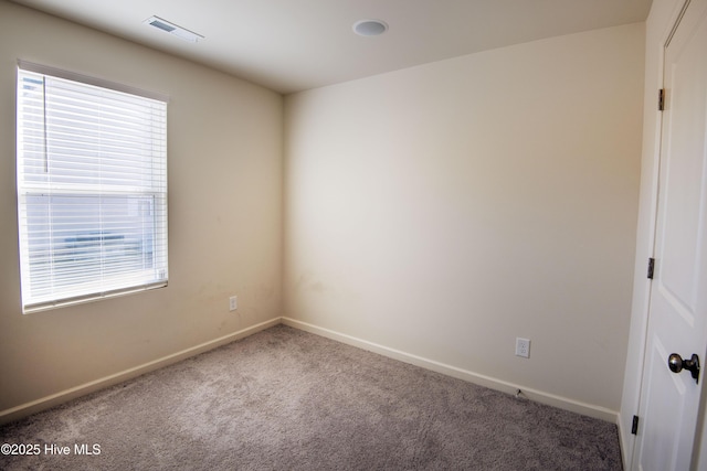 spare room with carpet flooring