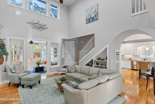 living room with plenty of natural light and light wood finished floors