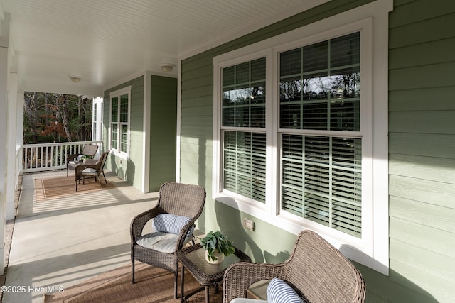 balcony featuring a porch