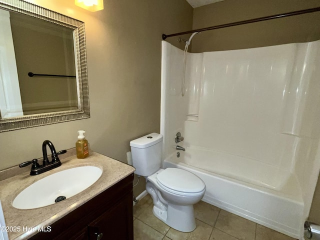 full bath featuring tile patterned floors, shower / bathtub combination, toilet, and vanity