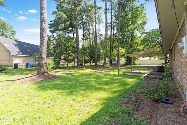 view of yard featuring central AC