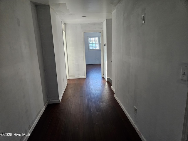 hall featuring dark wood-type flooring