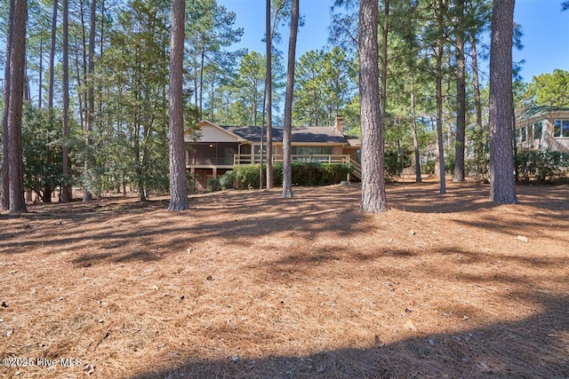 view of front of home with a chimney