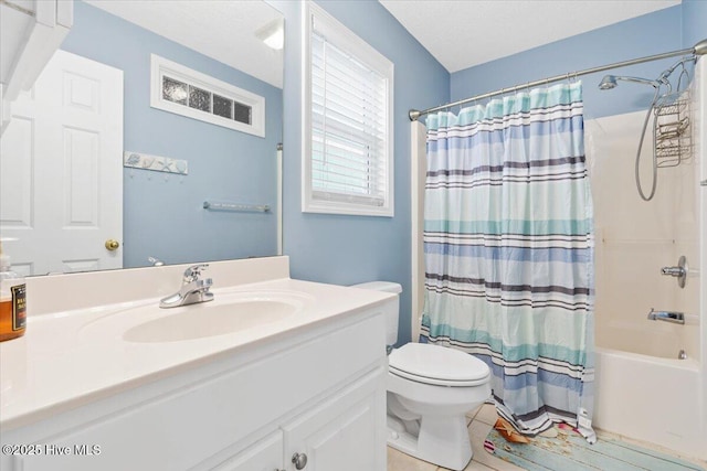 full bathroom with shower / bath combination with curtain, tile patterned floors, vanity, and toilet