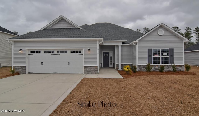 craftsman inspired home with a garage