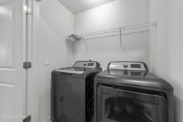 laundry room featuring washer and clothes dryer