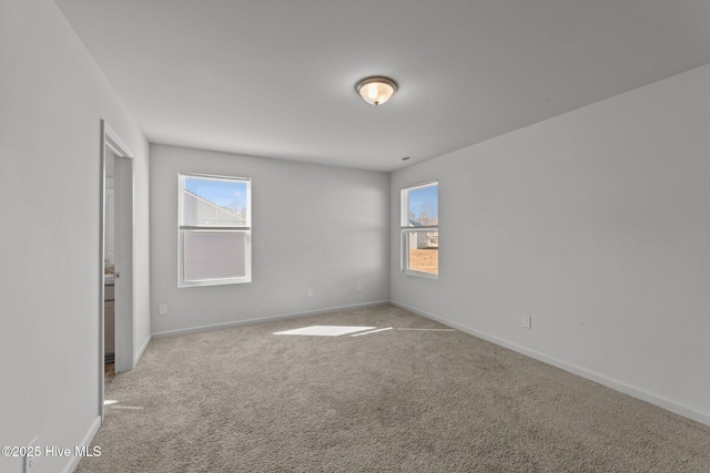 view of carpeted spare room