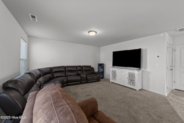 living room with light colored carpet