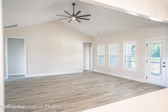 interior space featuring lofted ceiling, light wood-type flooring, and ceiling fan