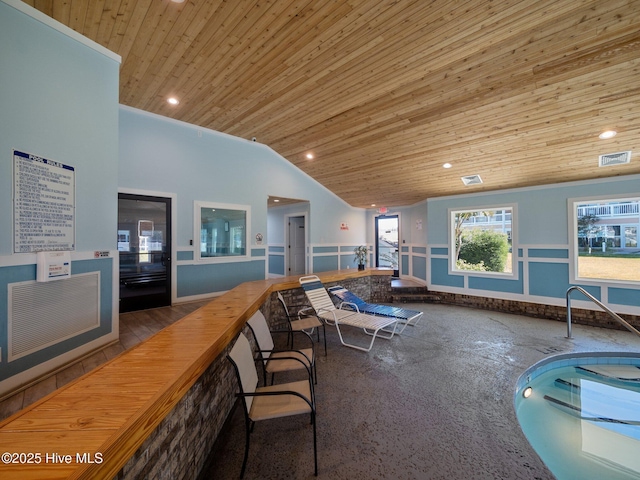 interior space with vaulted ceiling and wood ceiling