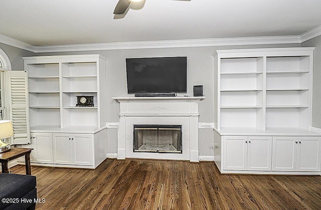 unfurnished living room with crown molding, ceiling fan, and dark hardwood / wood-style flooring