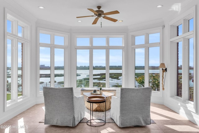 sunroom with a water view