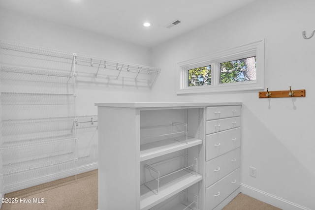 walk in closet featuring visible vents
