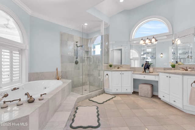 full bathroom featuring vanity, ornamental molding, a shower stall, and a bath
