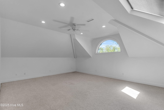 additional living space with baseboards, carpet flooring, recessed lighting, and vaulted ceiling