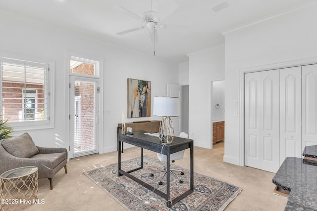 office with light colored carpet, crown molding, plenty of natural light, and a ceiling fan
