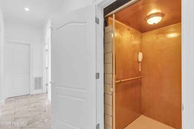bathroom with recessed lighting, marble finish floor, visible vents, crown molding, and elevator