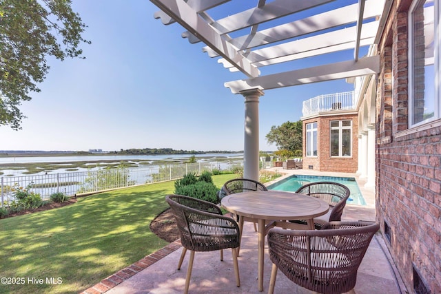 view of patio / terrace featuring a water view, a swimming pool, a pergola, fence, and a balcony